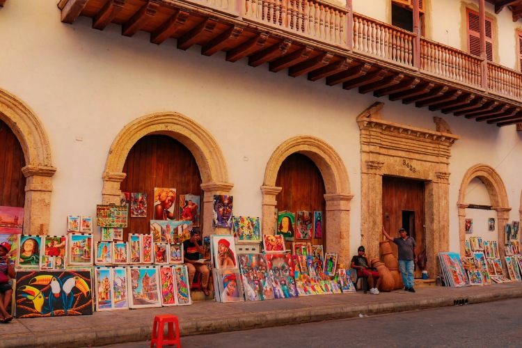 People Selling Paintings on Sidewalk in Cartagena